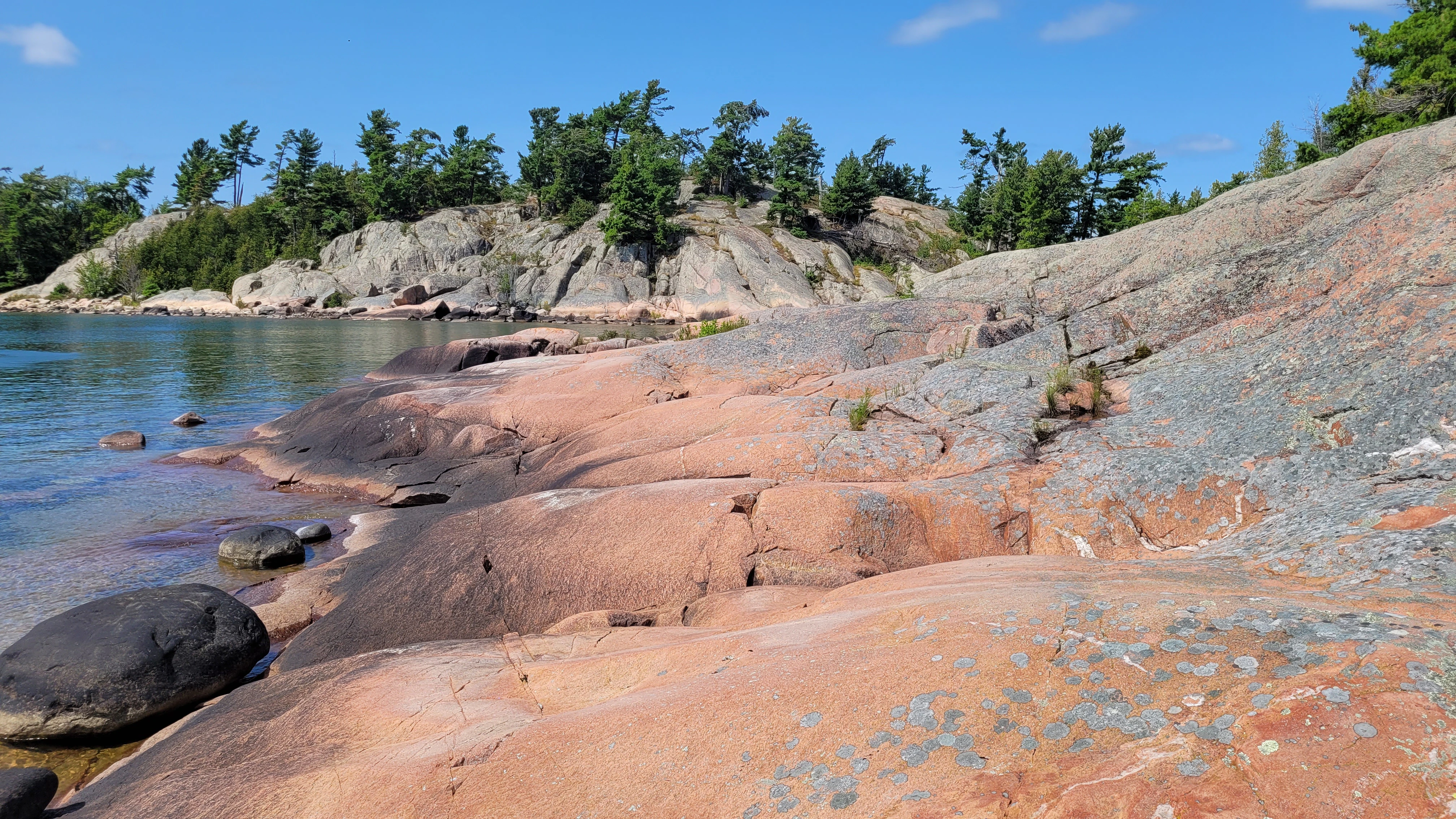 Pink Granite Rocks in Lake Hurons thirty thousand Islands Archipelago